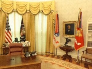 In joe biden's oval office, flags of the armed services are gone after redesign