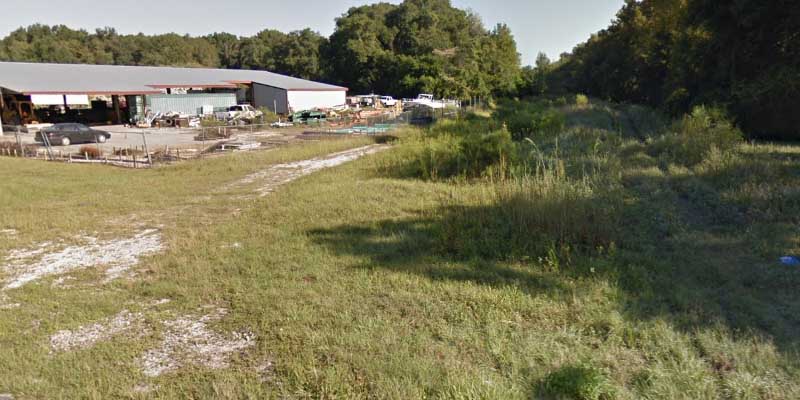 Woman trapped overnight after vehicle crashed into 40-foot deep sinkhole filled with water