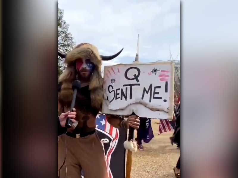 Man carrying spear, wearing furs and horned hat at Capitol uprising arrested