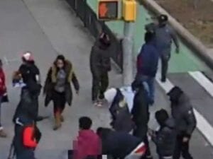 Caught on video: man beaten, stripped naked, robbed by group of thugs in new york city's chinatown