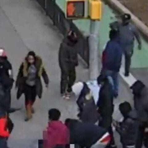 Caught on video: man beaten, stripped naked, robbed by group of thugs in new york city's chinatown - photo licensed by shore news network.