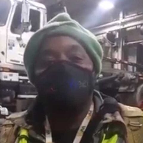 This guy's face mask says whatever the hell he wants it to say - photo licensed by shore news network.