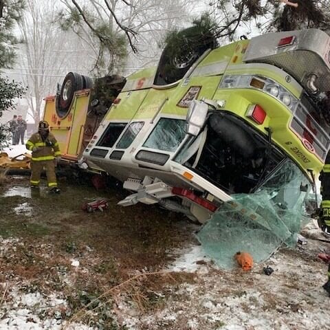 Firefighters recovering after engine skids out, flips over in snowstorm - photo licensed by shore news network.