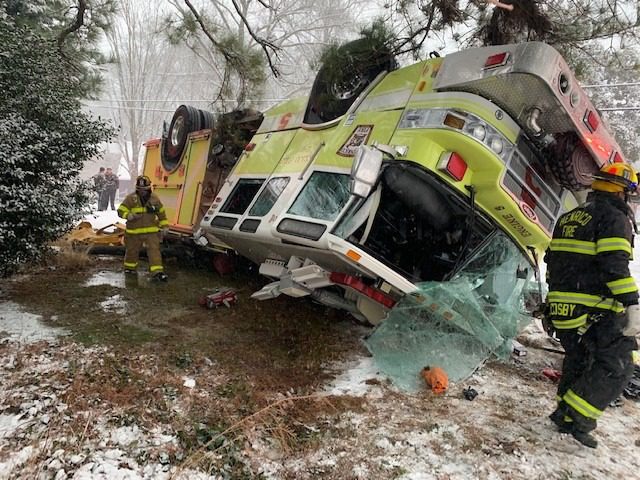 Firefighters recovering after engine skids out, flips over in snowstorm