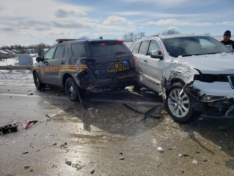 Driver going too fast, slams into police vehicle responding to previous crash