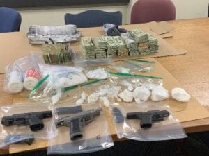 Two akron swat team raids yield drugs, guns, multiple arrests