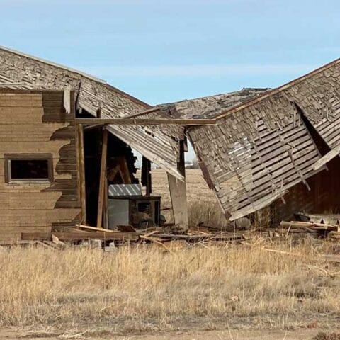 Man eluding police in u-haul smashes right through old farmhouse house, dukes of hazzard style - photo licensed by shore news network.