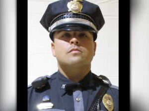 New mexico state police officer killed by in shootout at routine traffic stop