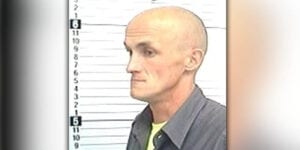 Man charged after striking child because he had a cell phone, choking another