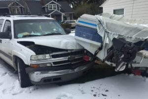 Portland burglary suspect caught after crashing suv into boat