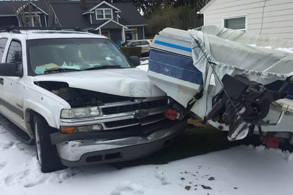 Portland burglary suspect caught after crashing SUV into boat