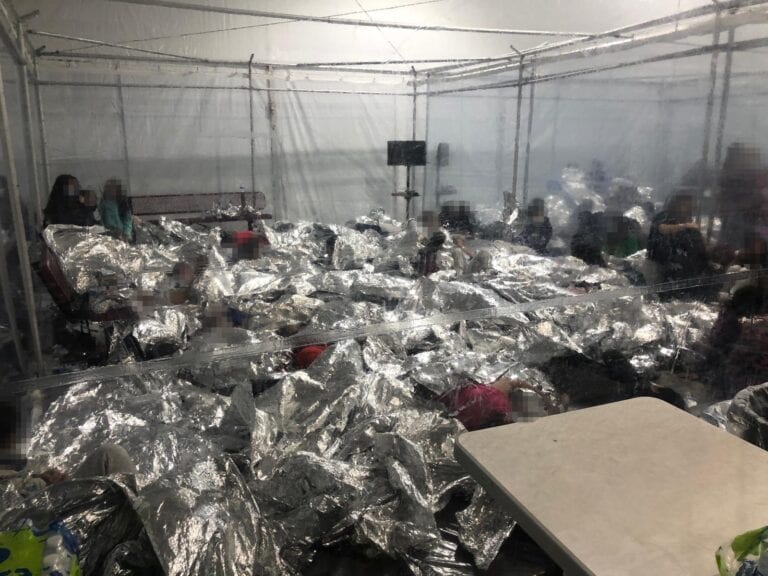 Biden official asked senators who visited child detention camps to delete pictures - photo licensed by shore news network.