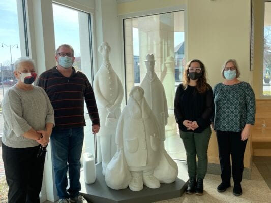 Gary hughes sculpture “bus stop” installed at rehoboth city hall