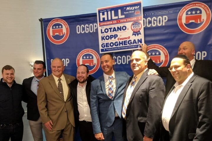 July 2019: Toms RIver Mayor Mo Hill poses with his council candidates and campaign supporters after 2019 election victory.