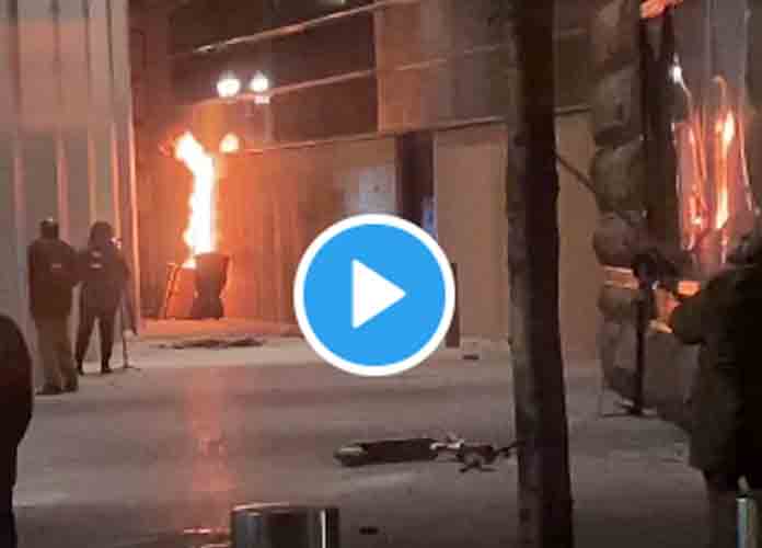 Watch: Armed, violent left wing militants attempt to burn federal building with people inside