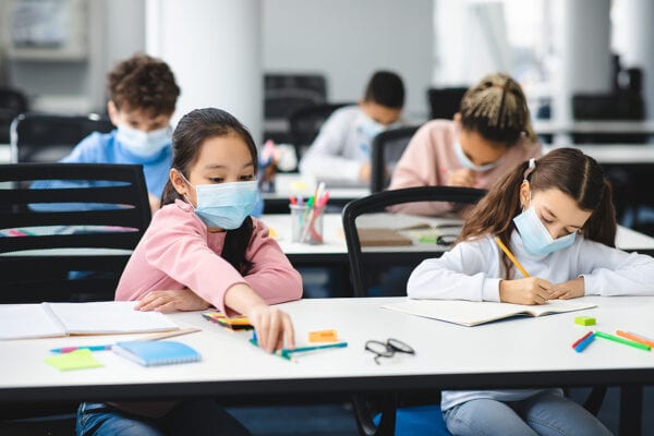 Social distancing reduced to three feet in schools, six everywhere else
