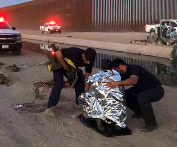 Border Patrol Agents Rescue Father and His Child from Near Death in Canal