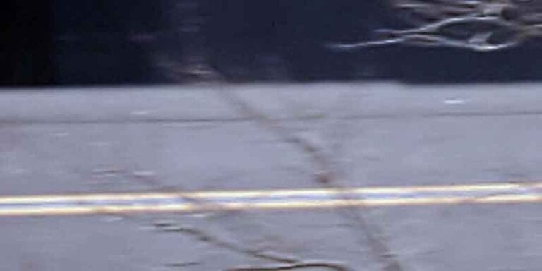 Ocean county commissioners removing blue line painted overnight in downtown toms river - photo licensed by shore news network.