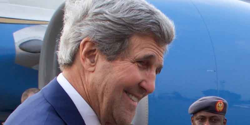 U.S. Climate Czar John Kerry Caught on Commercial Flight Maskless