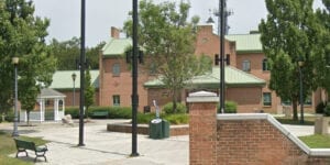 Jackson police say man acting "frenzied" ran through police hq biting cops, threatened to defecate on them