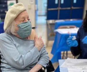 103-year-old survivor of two pandemics gets covid-19 vaccine