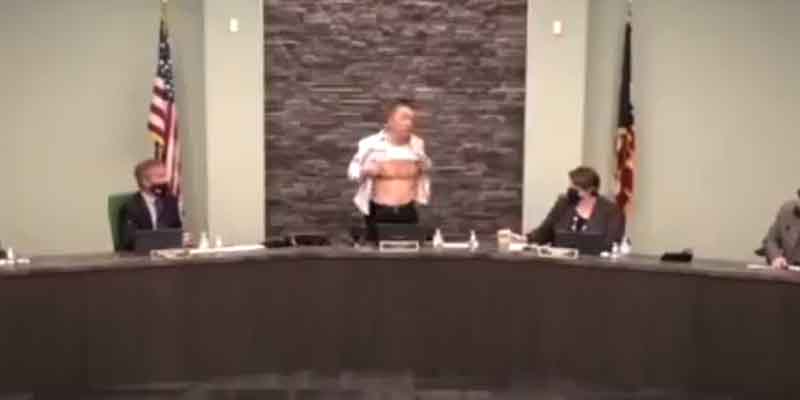Asian councilman took off his shirt during town hall meeting to show how American he is
