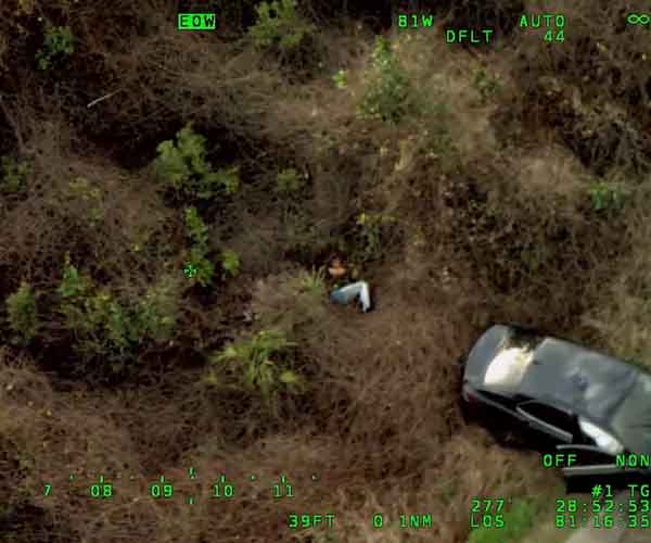 Watch: Two suspects linked to I-4 shooting captured after fleeing police, rolling over car