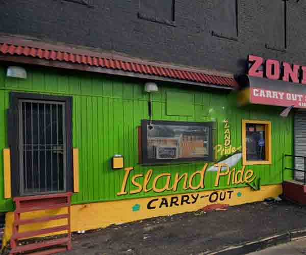 Three shot inside Baltimore's Island Pride Carry-Out restaurant