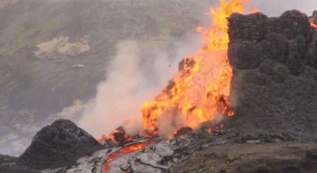 Volcano in iceland breaks apart as spectators cheer