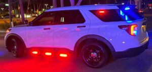 Woman found slumped over in car, passed out