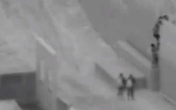Another child dropped from atop u. S. Border wall by human traffickers - photo licensed by shore news network.