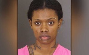 Woman arrested for shooting man in face in baltimore