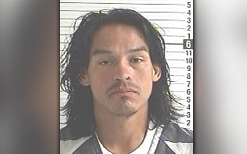 Suspect stole officer's gun and struck him, then he was shot