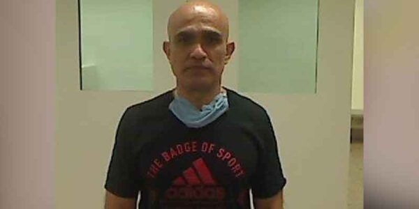 Convicted illegal immigrant rapist wearing adidas shirt sent back to mexico - photo licensed by shore news network.