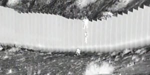 Cruel and Horrific Watch as Human traffickers drop toddlers from 14 foot high border wall abandon them in desert
