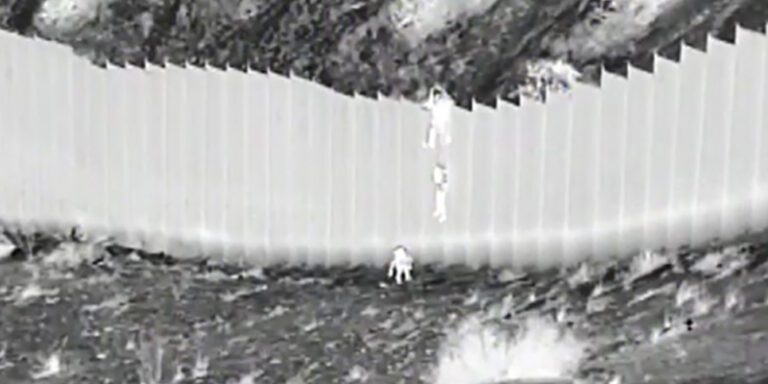 Cruel and horrific: watch as human traffickers drop toddlers from 14-foot high border wall, abandon them in desert - photo licensed by shore news network.