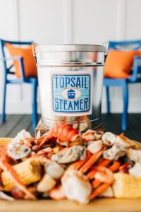 Make memories with a unique seafood experience topsail steamer opens sea isle storefront