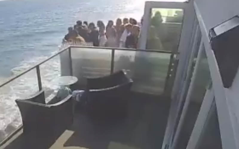 6 people injured after an overcrowded balcony collapsed beneath them
