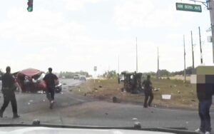 She pretended she was dead as he choked her, then fled from police causing crash