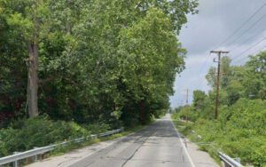 Police say body found in woods was city's 71st murder of 2021