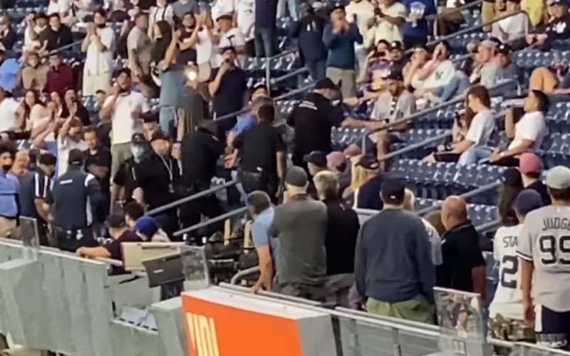 The New America: Yankee fans handcuffed, escorted out of stadium for "Trump Won" banner