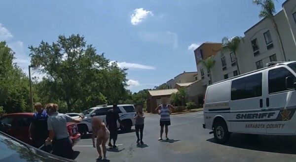 Watch as Sarasota Police save Pitbull from near death in locked hot car
