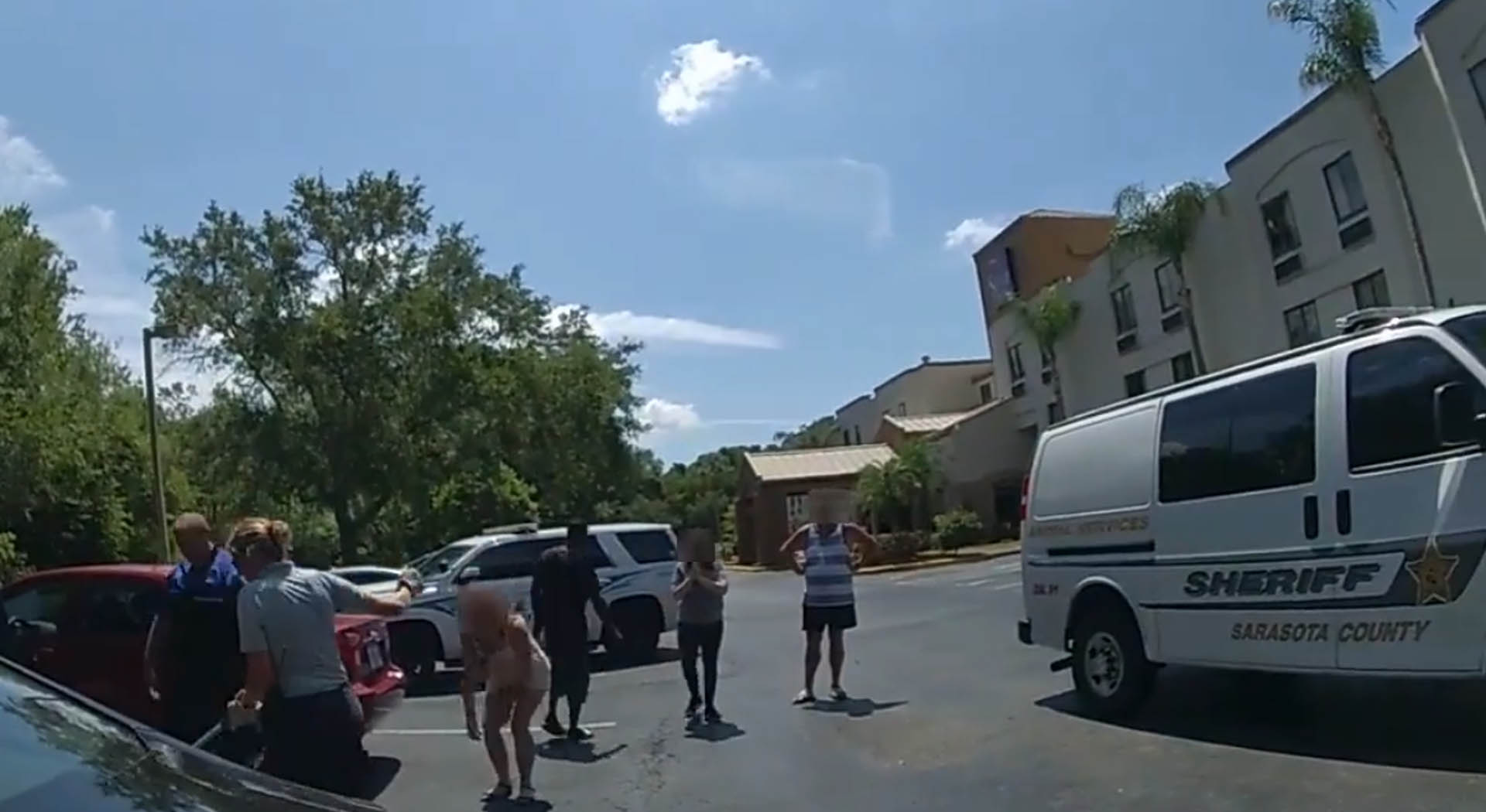 Watch as Sarasota Police save Pitbull from near death in locked hot car