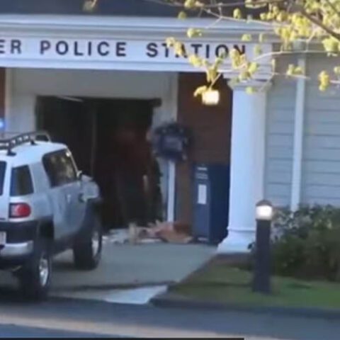 Man shot after ramming his suv through front door of police station - photo licensed by shore news network.