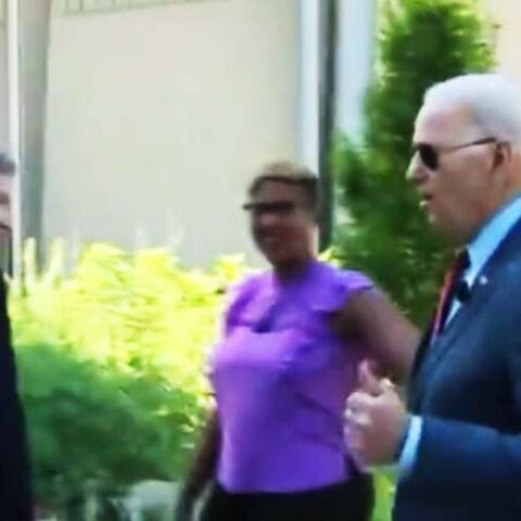 Presidential handlers usher confused biden away from reporters - photo licensed by shore news network.
