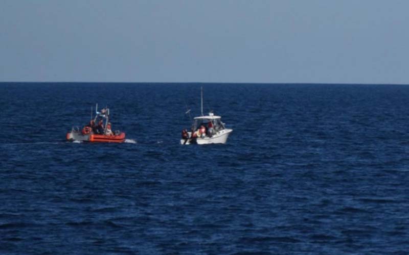 Coast Guard rescues four from sinking boat off coast near Wachapreague Inlet