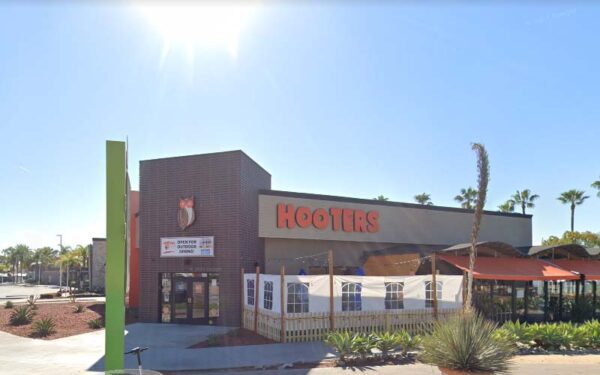 Three shot in drive-by at hooters near popular long beach tourist spot - photo licensed by shore news network.