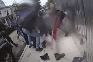 Newark police officers attacked by angry mob during arrest