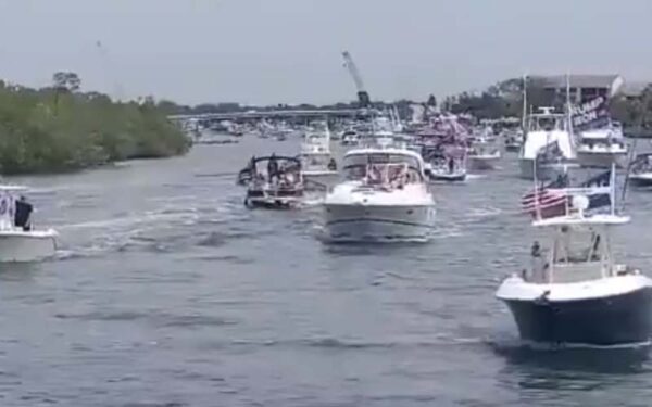 Massive patriotic, trump-themed boat parade filled jupiter waterways on memorial day - photo licensed by shore news network.