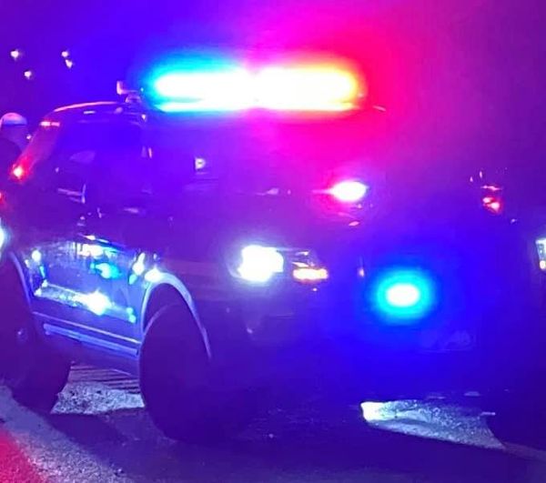 Two shot sitting in car in Mifflin Township